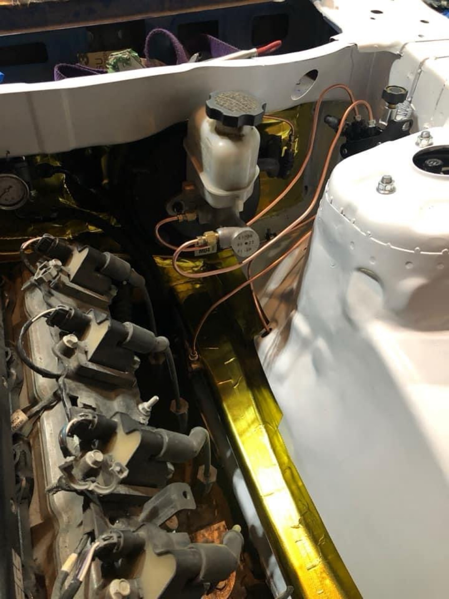 Hard lines run in engine bay after ABS delete