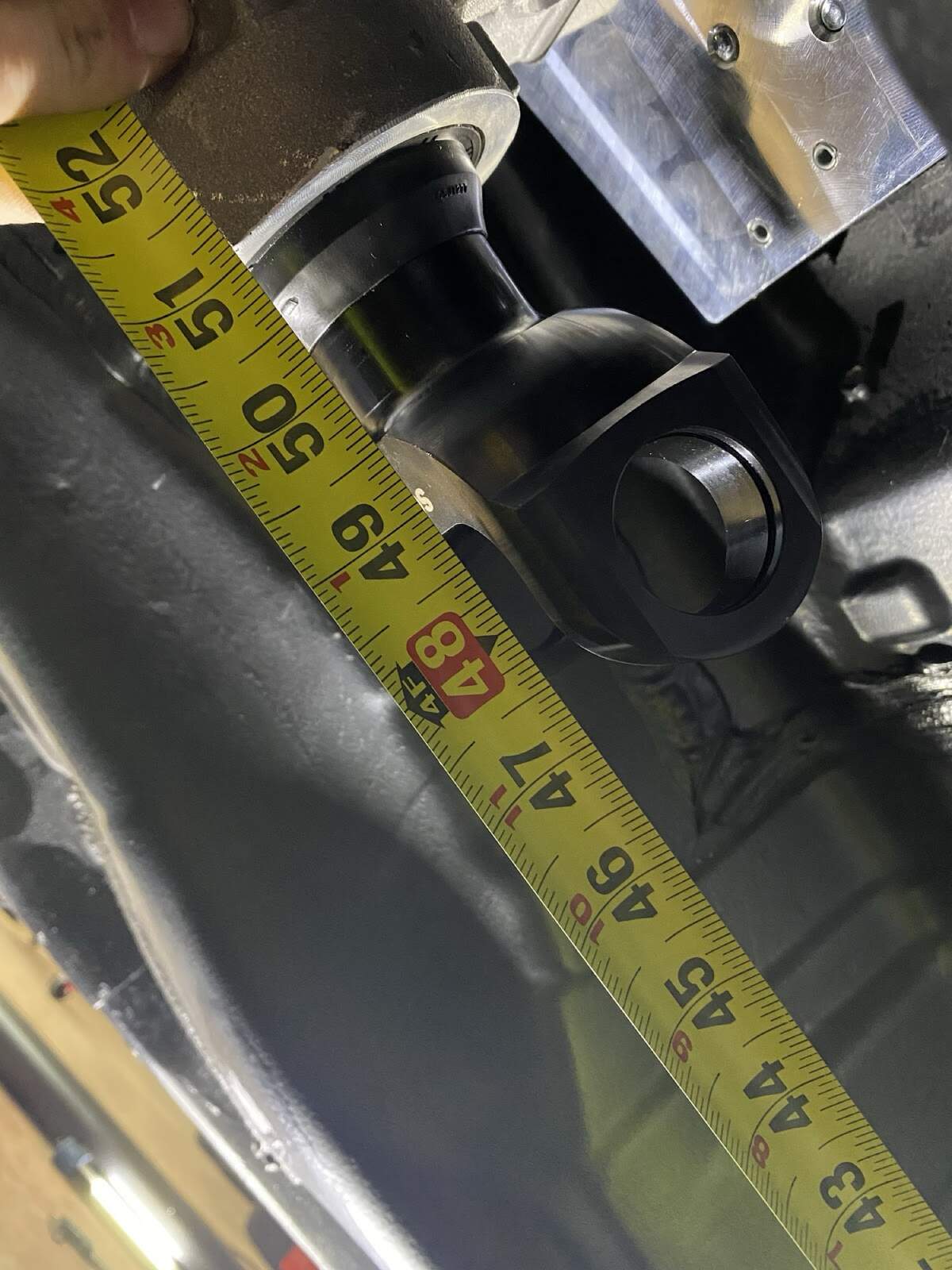 Tape measure measuring driveshaft length