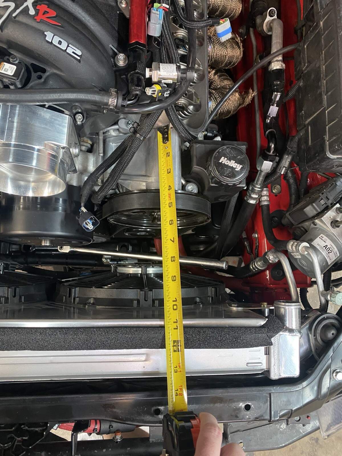 Tape measure between LS accessory drive and radiator