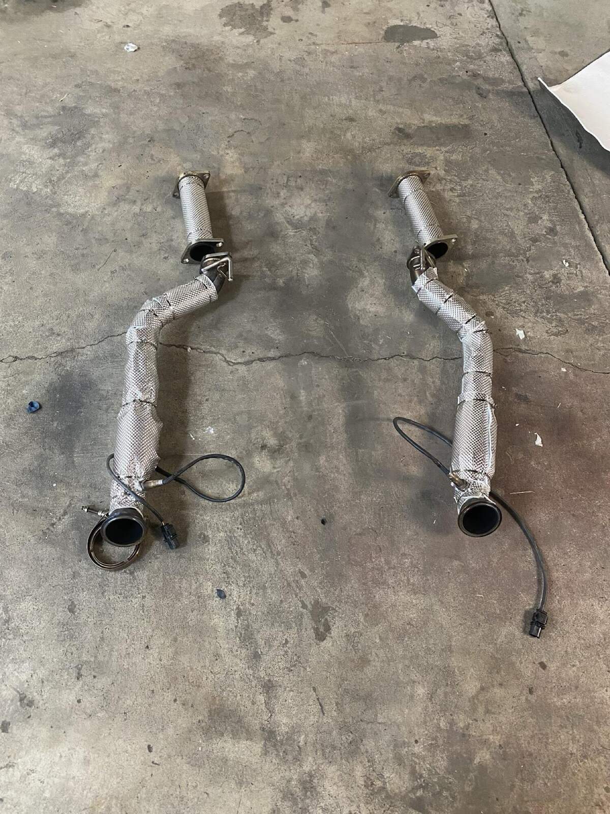 Wrapped exhaust pipes