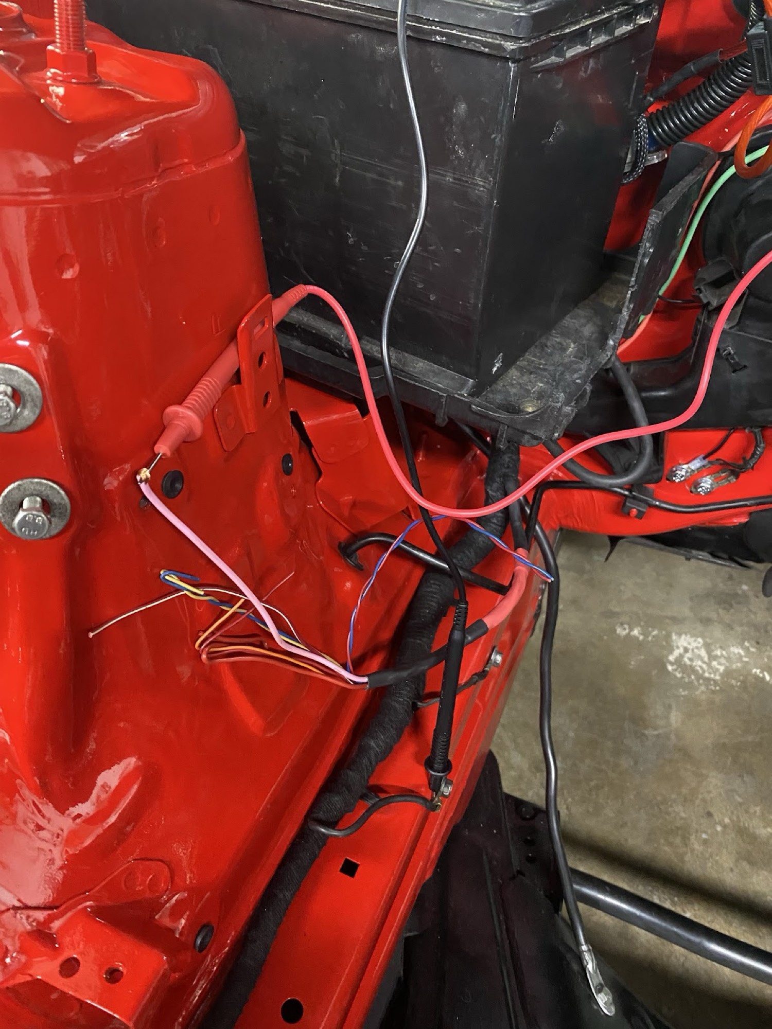 Pink push-to-start wire routed in engine bay toward the starter